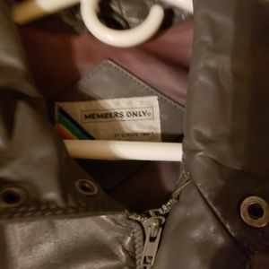 1983 members only leather jacket.